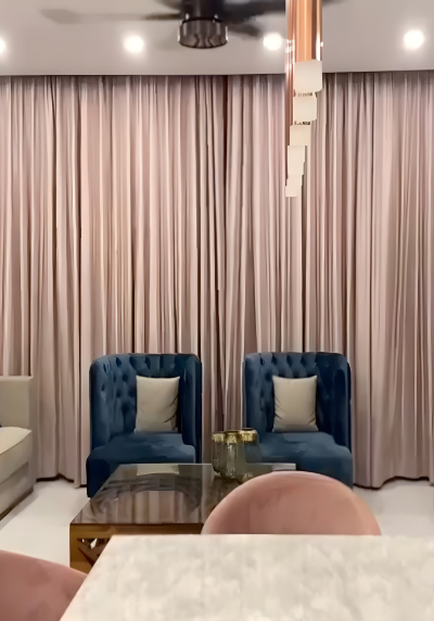 living-room-with-pink-pleated-curtains